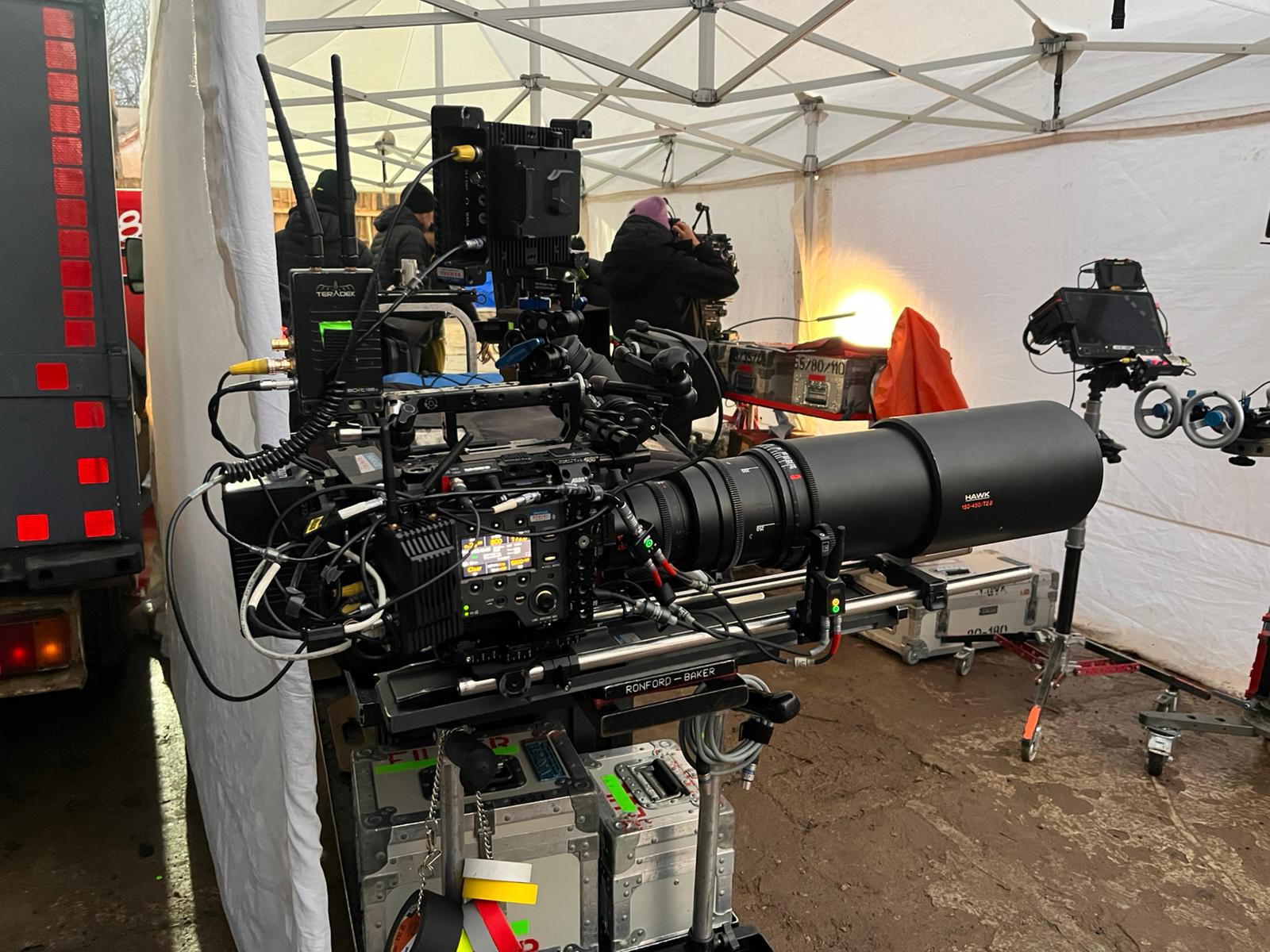 Heavy-lift drone carrying a cinema camera rig on set